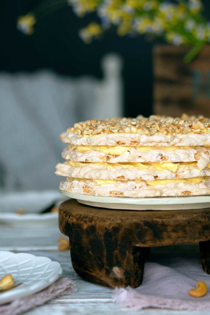 sans rival cake on a wooden stand