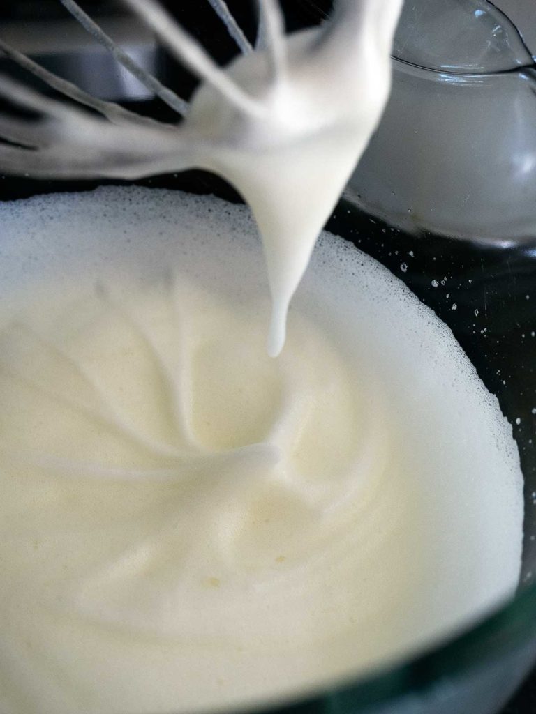 egg whites that have been whipped to soft peaks