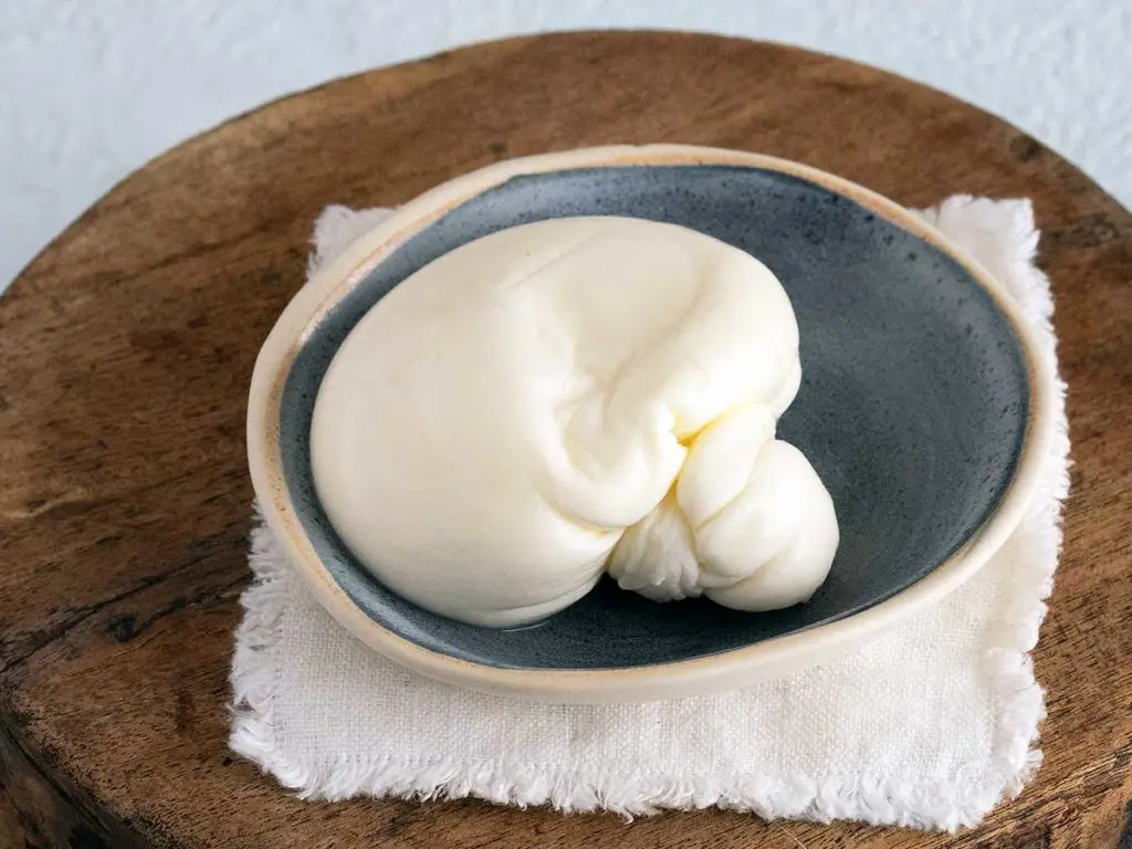 burrata in a blue bowl