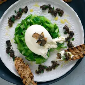 burrata and salsa tartufata with diced celery and asparagus