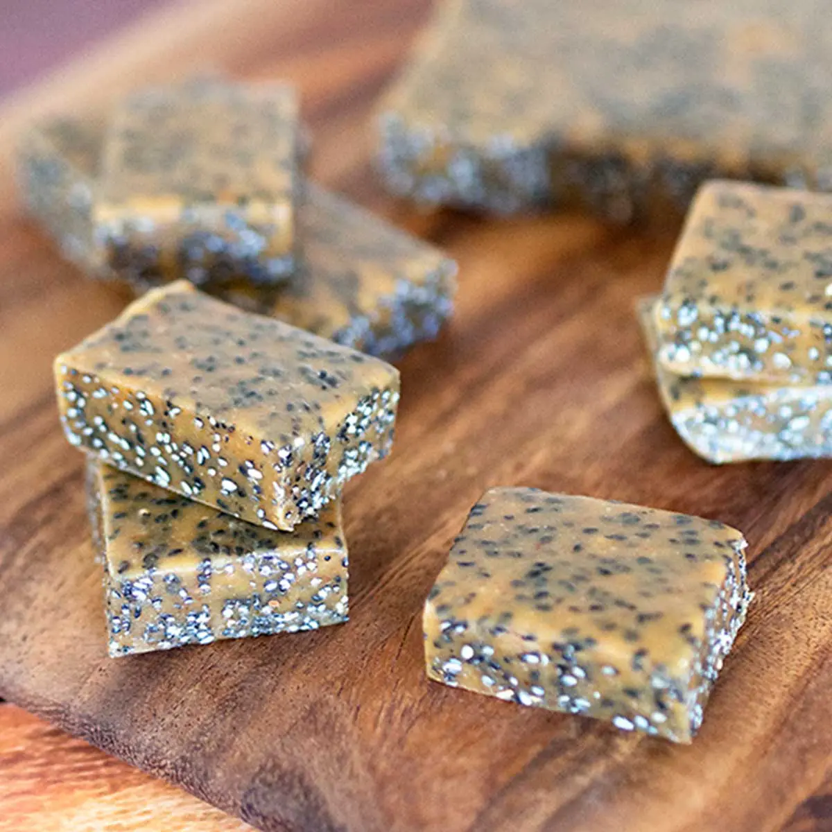 slices of caramel with black sesame mixed into it.