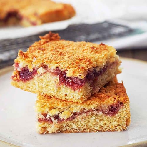 Easy Coconut Slice with Jam Belly Rumbles