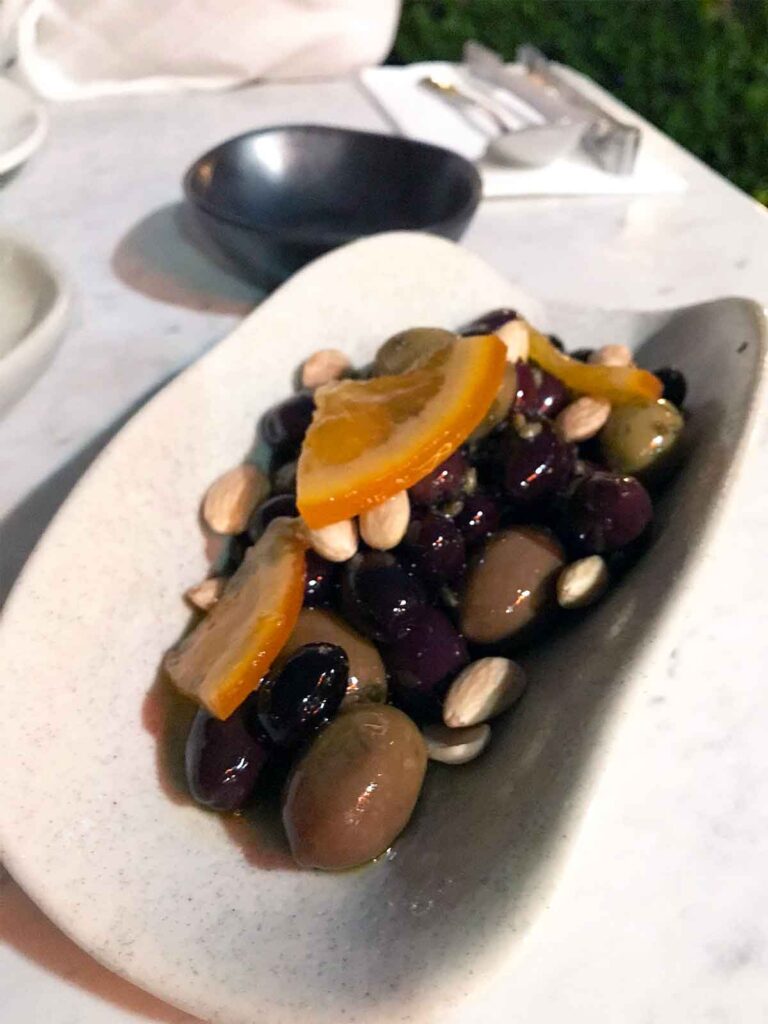 mixed olives with orange in a bowl