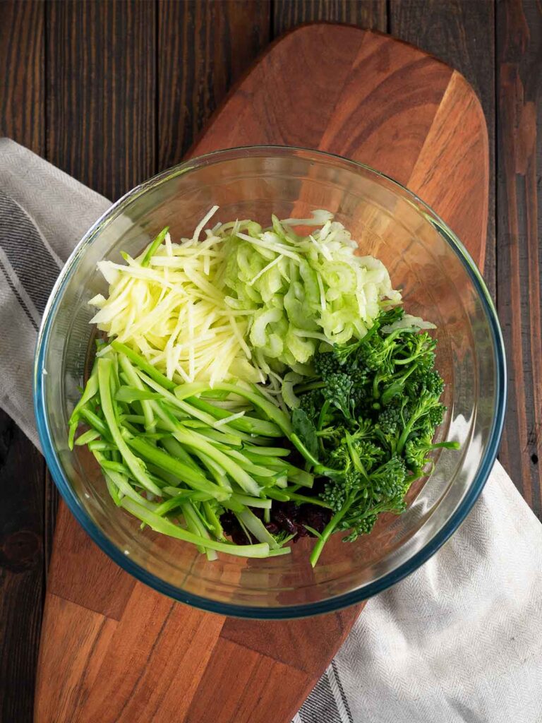 slaw ingredients in a glass bowl