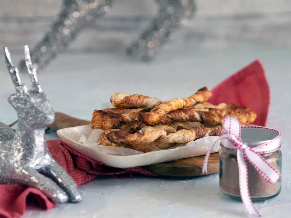 pastry twists using Christmas sugar on a plate