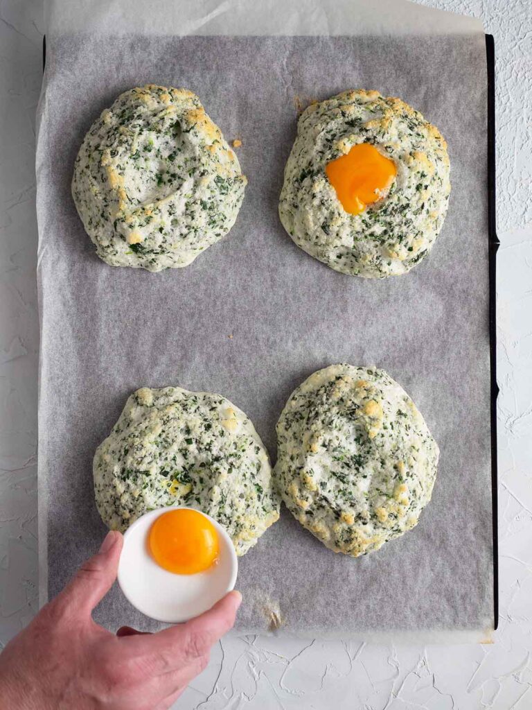 placing egg yolks on top of semi baked egg whites