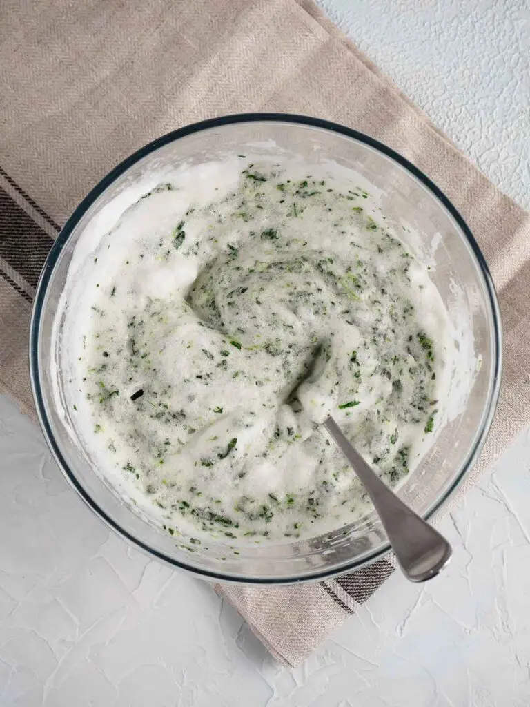 spinach mixture mixed into whipped egg whites