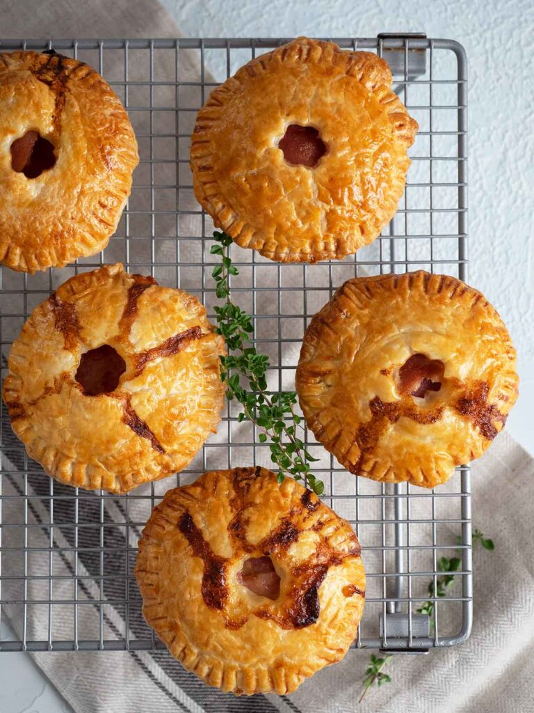 baked ham pies on a cake rack