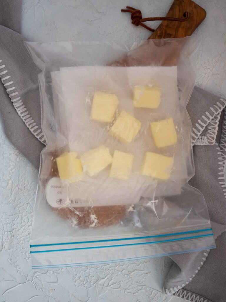 placing butter in the zip lock bag ready to smoke