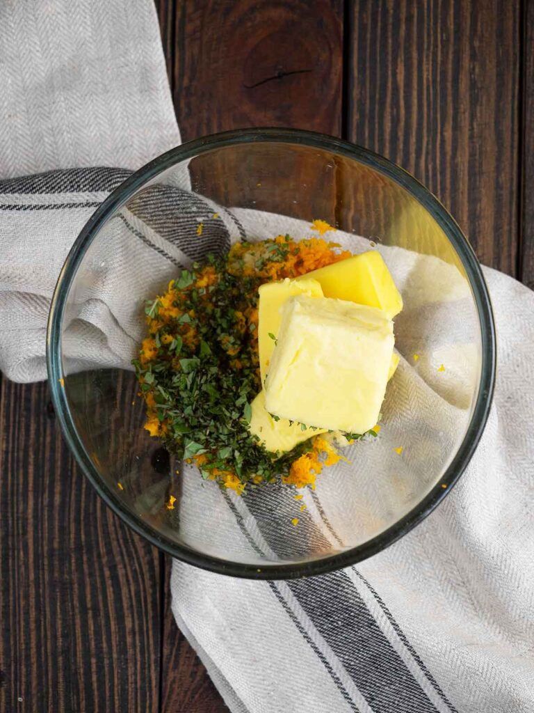 orange butter ingredients in a glass bowl