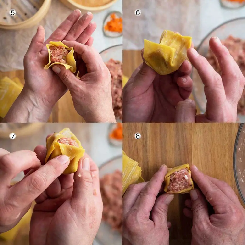 close up of hands folding dumplings