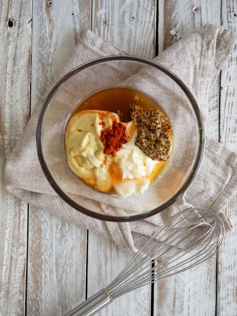 honey mustard sauce ingredients in a glass bowl