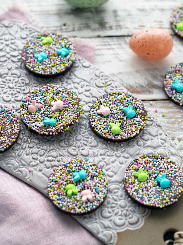 Easter chocolate freckles on a ceramic tray