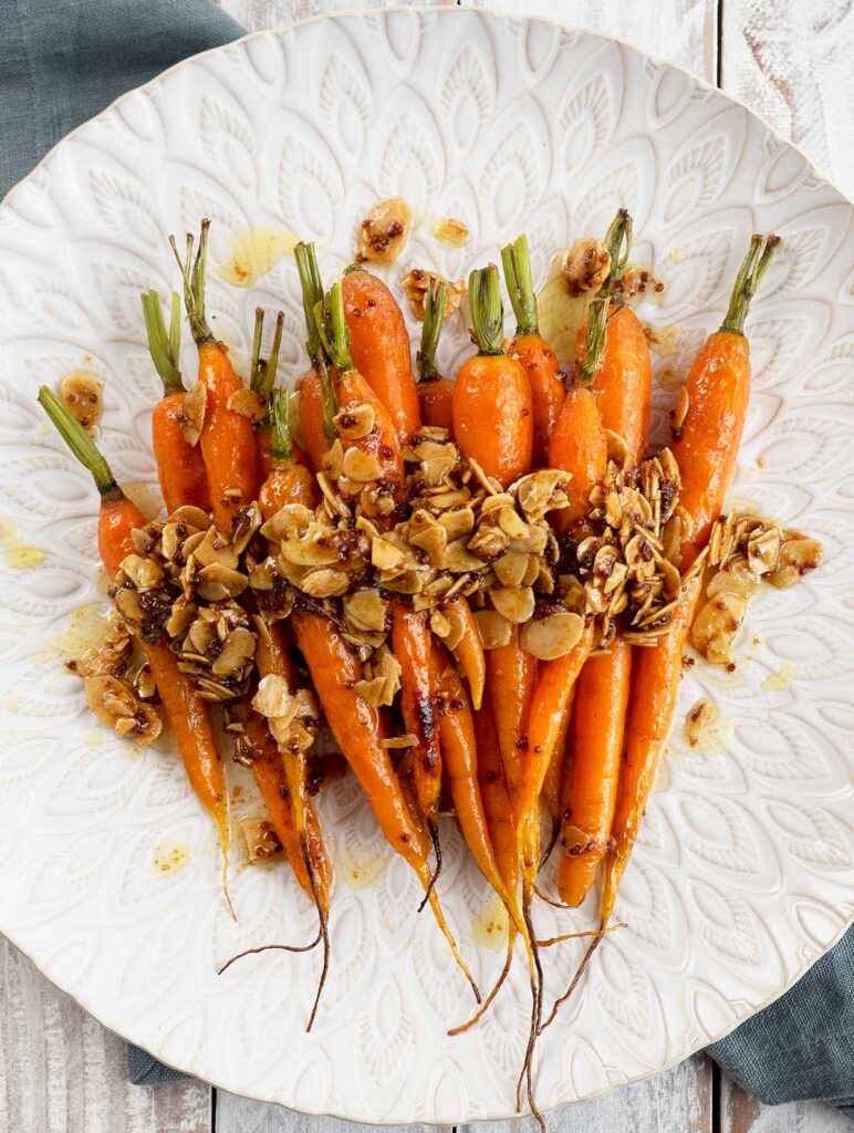 roasted dutch carrots on a white platter