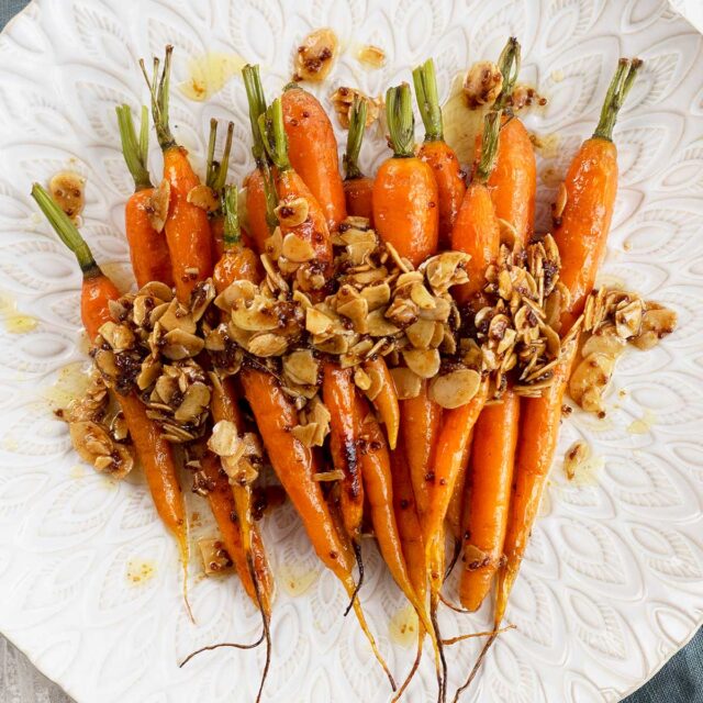 Roasted Dutch Carrots with buttery honey almonds Belly Rumbles