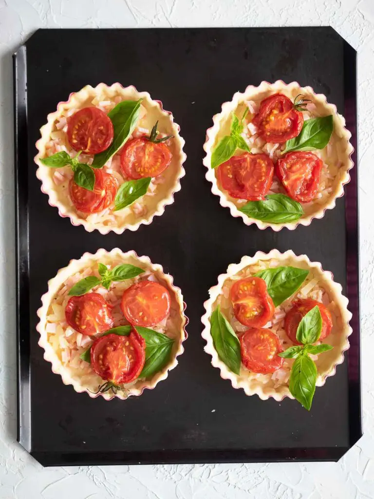 tomatoes basil in tart shells