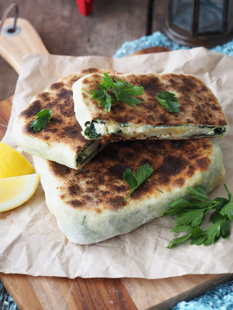 gozleme sliced in half showing the filling