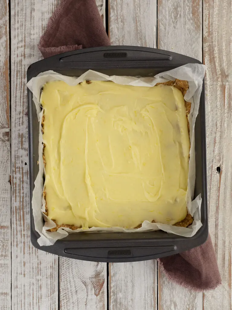 lemon slice frosted with icing in the tin