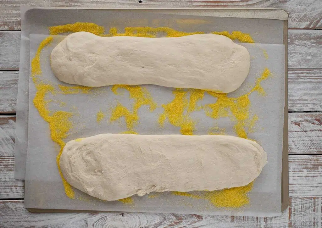 bread dough shaped on a baking tray