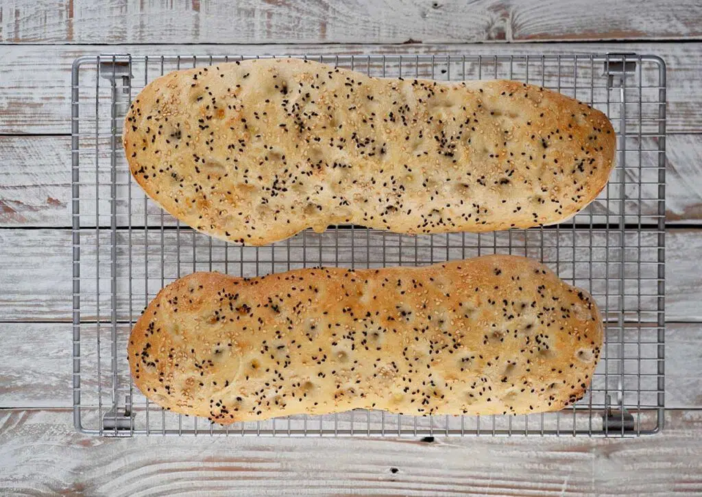 bread loaves out of the oven on a wire rack