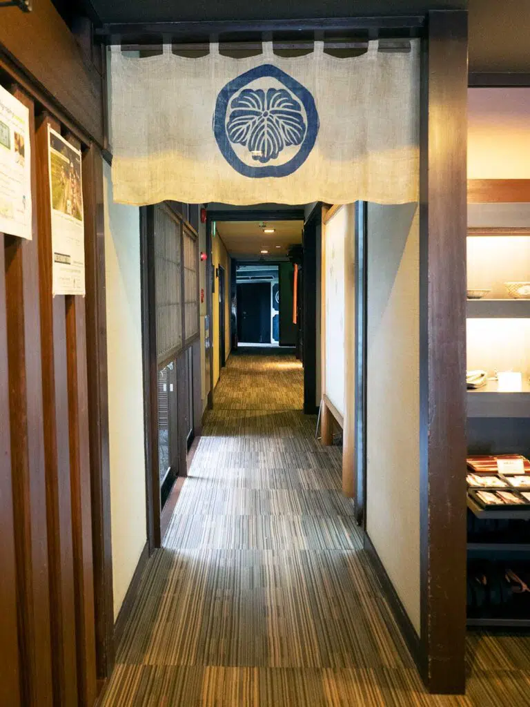 hall leading to hot baths at tanabe ryokan