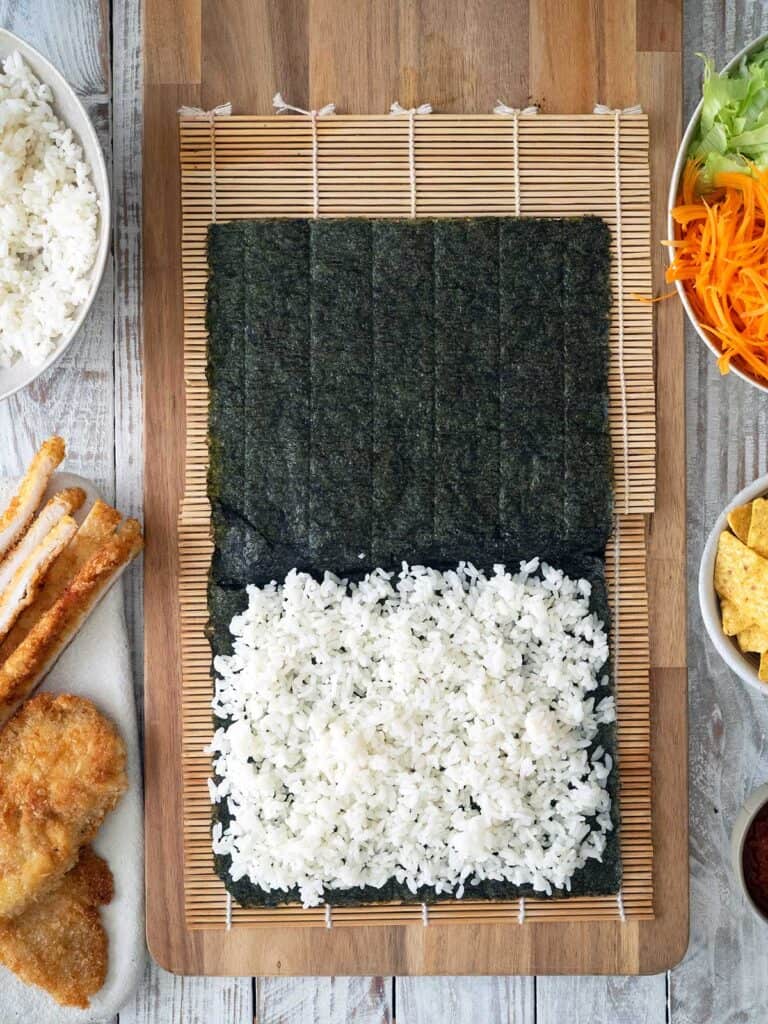 Rice placed on a nori sheet.