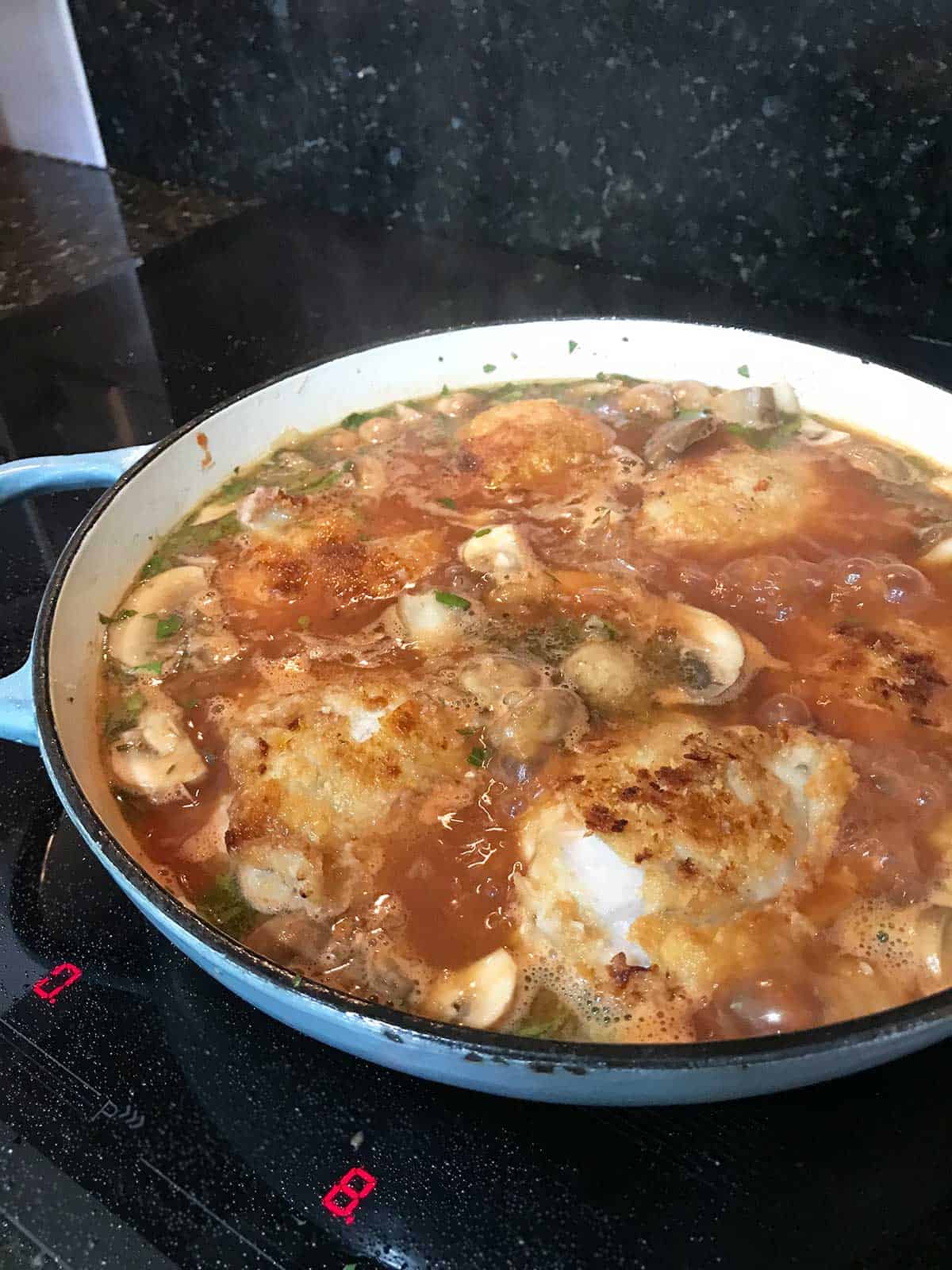 All of the ingredients in the pan before the lid goes on for the final cook.