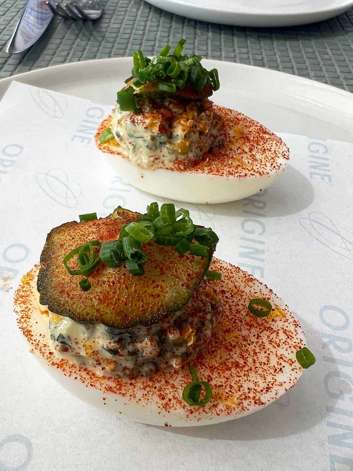 Devilled eggs sprinkled with paprika.