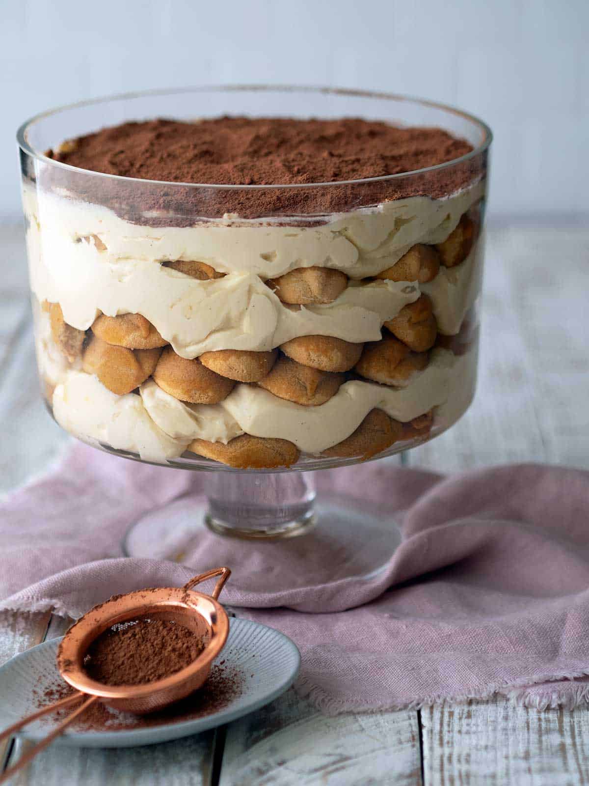 Eggless tiramisu in a large glass bowl.