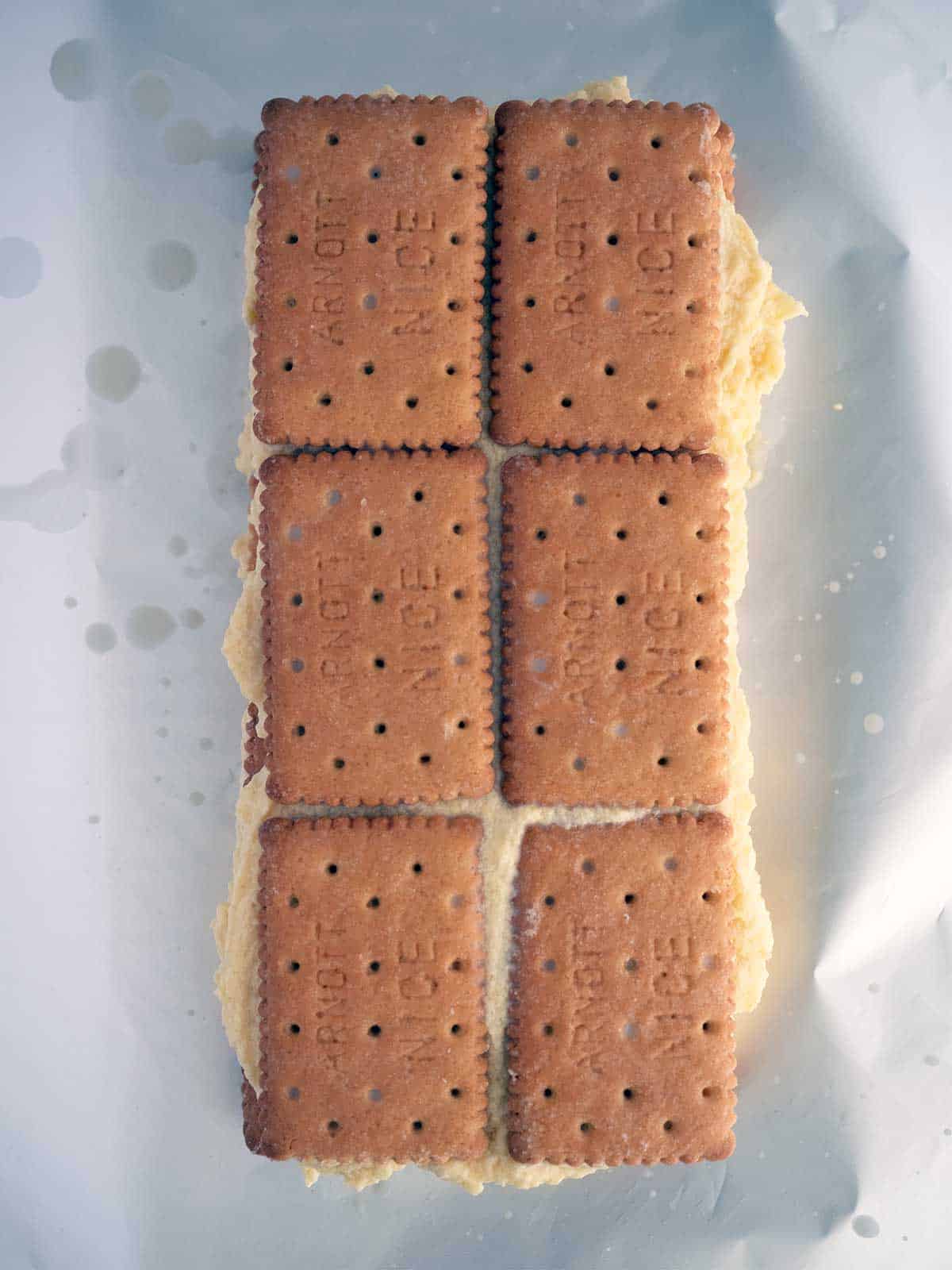 Final layer of biscuits on the biscotten torte.