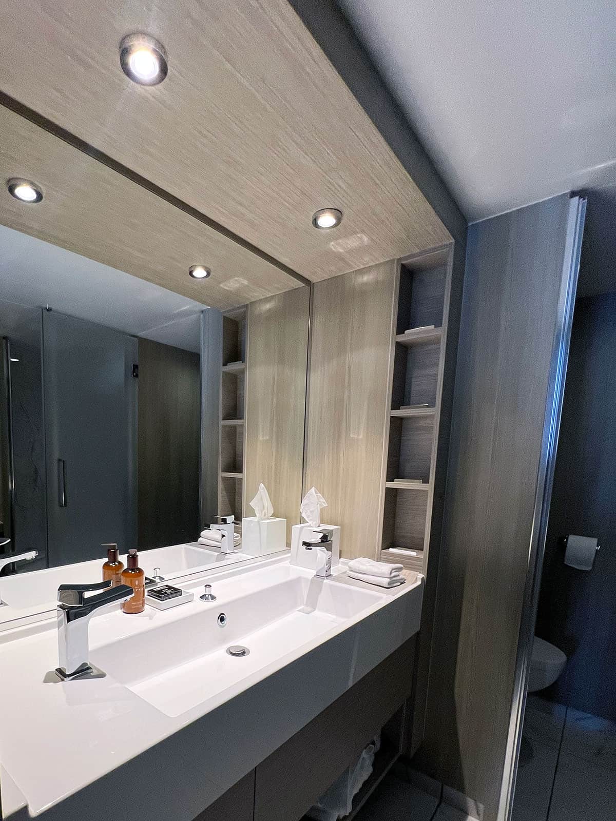 Bathroom vanity with large sink.