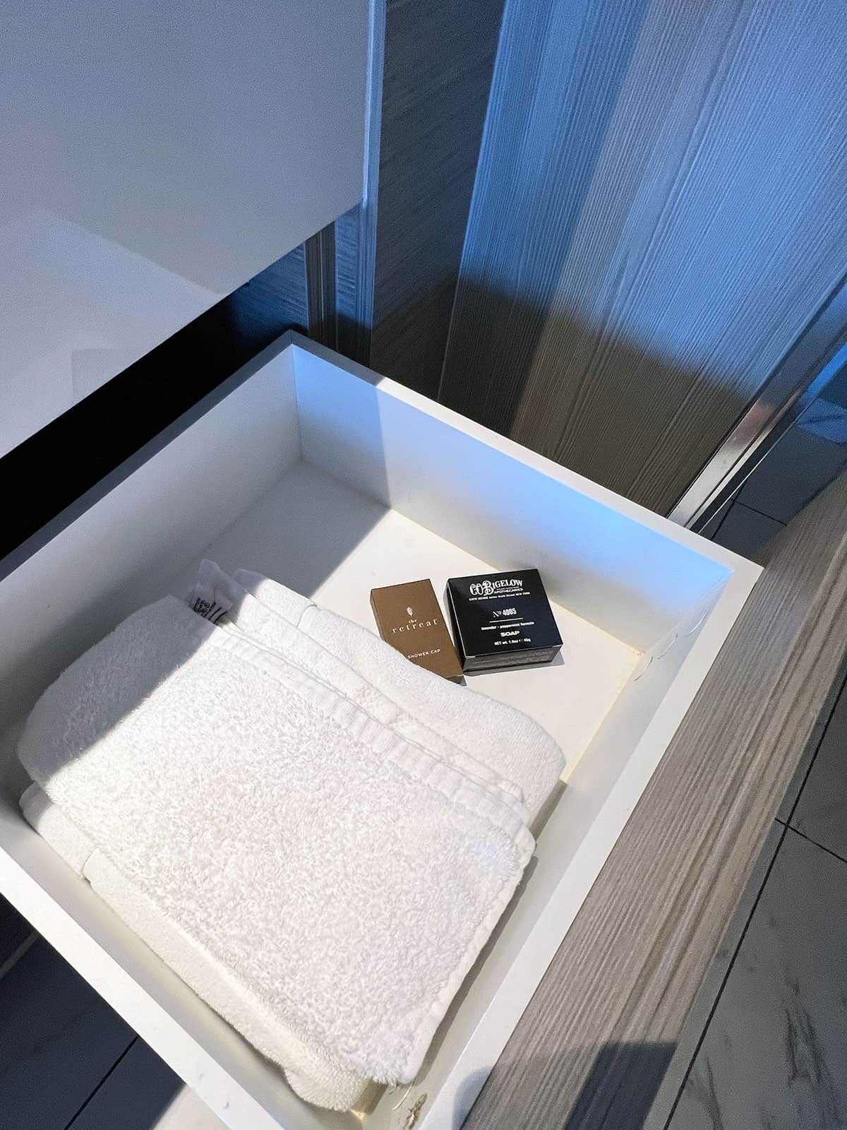 Extra towels and soap in a drawer.