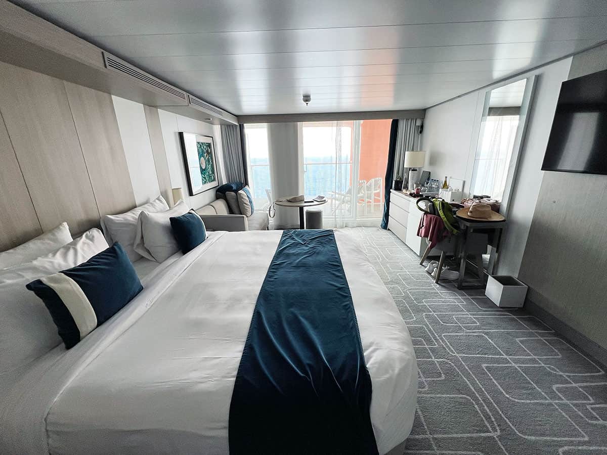 View over bed towards the suite balcony.
